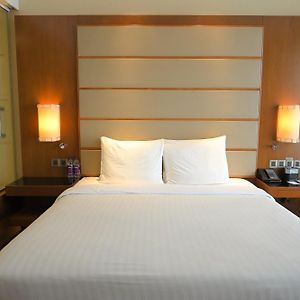 Deluxe King Room complimentary airport transfers